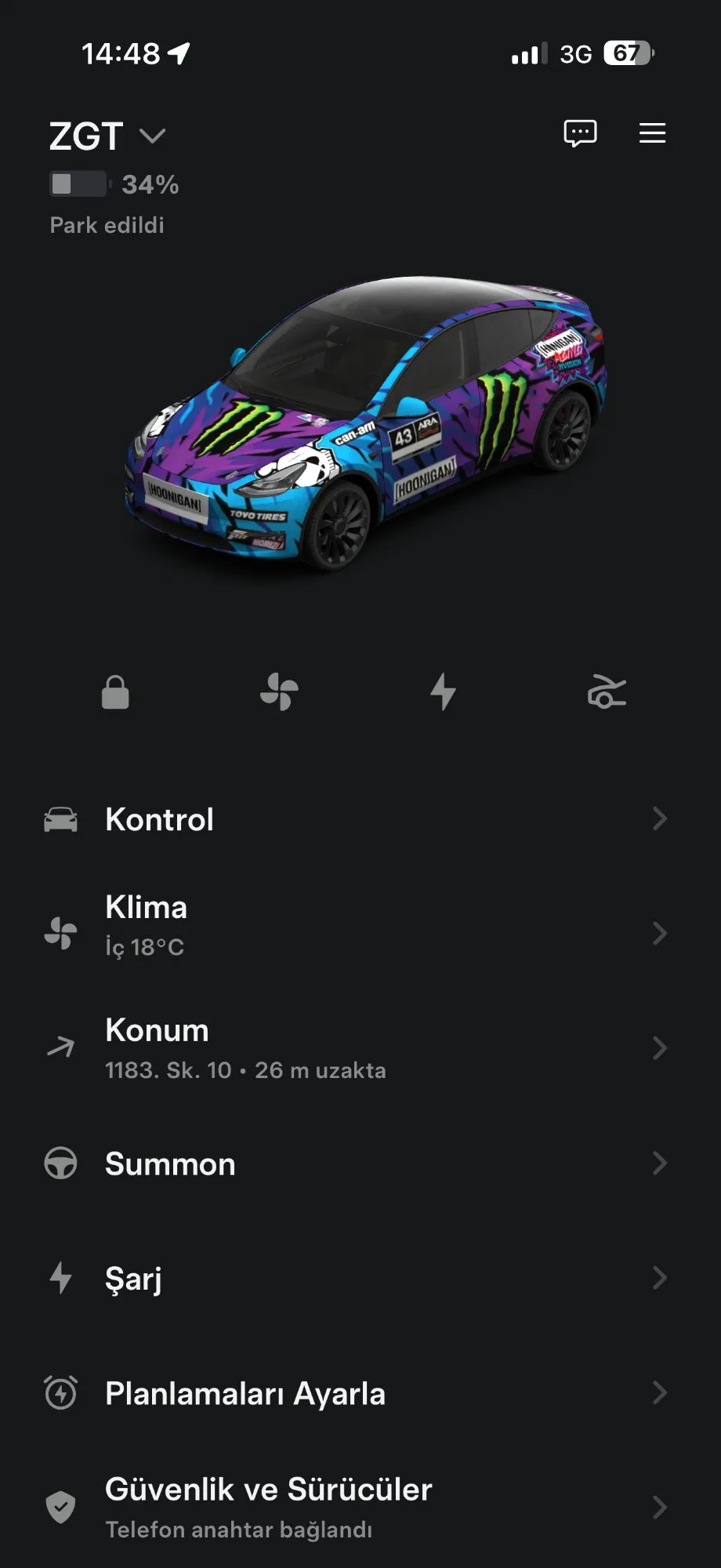 Tesla mobile app showing Hoonigan wrapped vehicle - main menu view